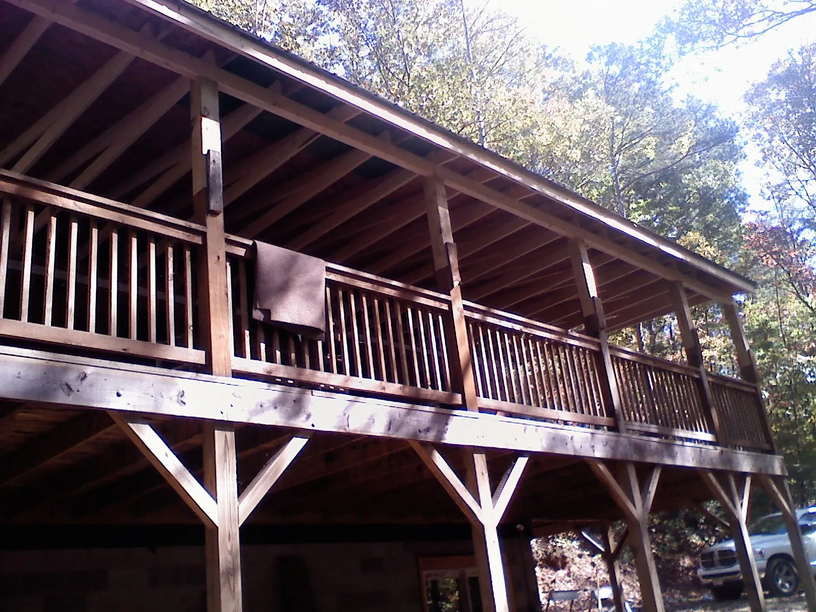 Timber framing under a new elevated porch and deck — Roof Leak Repair in La Conner by Roofing Brothers